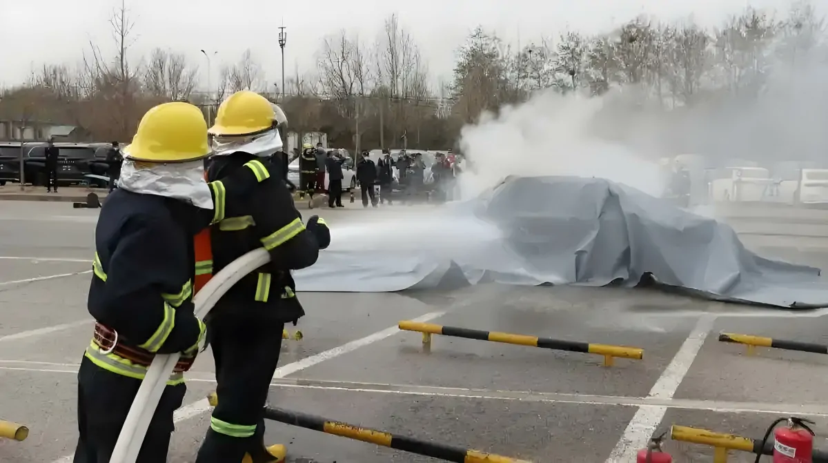 Using an Electric Car Fire Blanket to Fight Fire